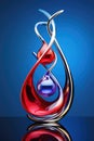 a glass sculpture of a red and blue liquid