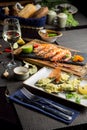 glass of semi-dry white wine an aperitif. Wine with grilled meat and vegetables. Close-up. Concept - table setting in a