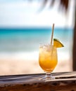 Glass with sex on the beach cocktail on wooden board against seascape, blue sky and palm leaf. Summer vacation concept. Created