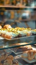 Glass showcase in cafe features delectable close up of chocolate cookies