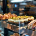 Glass showcase in cafe features delectable close up of chocolate cookies