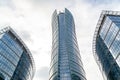 Glass skyscrapers of irregular shape. Bottom view. Abstract architectural detail of corporate building suitable as Royalty Free Stock Photo