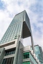 Glass skyscrapers of irregular shape. Bottom view. Abstract architectural detail of corporate building suitable as Royalty Free Stock Photo