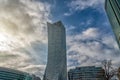 Glass skyscrapers of irregular shape. Bottom view. Abstract architectural detail of corporate building suitable as Royalty Free Stock Photo