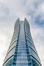 Glass skyscrapers of irregular shape. Bottom view. Abstract architectural detail of corporate building suitable as background Royalty Free Stock Photo