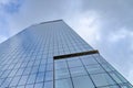 Glass skyscrapers of irregular shape. Bottom view. Abstract architectural detail of corporate building suitable as Royalty Free Stock Photo