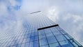 Glass skyscrapers of irregular shape. Bottom view. Abstract architectural detail of corporate building suitable as Royalty Free Stock Photo