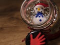 Glass snowman in a glass bottle with pearls