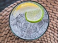 Glass of soda water with ice and lime Royalty Free Stock Photo