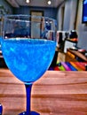 Glass of something blue