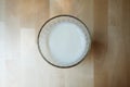 Glass with soy milk bubble foam top view. Royalty Free Stock Photo