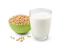 Glass of Soy milk with soybeans in green bowl isolated on white background Royalty Free Stock Photo