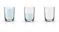 Glass of sparkling water, half full glass and empty glass Royalty Free Stock Photo