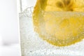 Glass with sparkling water and lemon slice Royalty Free Stock Photo