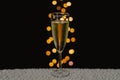 A glass of sparkling wine with bokeh lights. Royalty Free Stock Photo