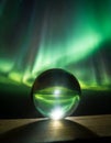 A glass sphere in front of northern light