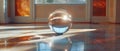 A glass sphere sits on a shiny wooden floor, reflecting light and shadows Royalty Free Stock Photo