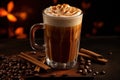 glass with spiced latte, cinnamon sticks, coffee beans and pumpkin on a dark background. Royalty Free Stock Photo