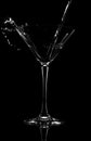 Glass with splash martini water Royalty Free Stock Photo