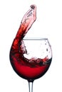 Glass with a splash of red wine isolated on white background Royalty Free Stock Photo