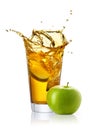 Glass of splashing apple juice Royalty Free Stock Photo