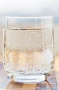 Glass of spring mineral water with gas