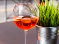 Glass of Spritz drink with ice on table