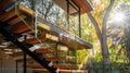 The glass staircase with wooden steps and handrails seems to float in the space as it leads up to the second floor. The