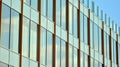 Modern architectural details. Modern glass facade with a geometric pattern Royalty Free Stock Photo