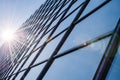 Glass and steel - mirrored facade of modern office building