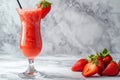 A glass of strawberry daiquiri cocktail and fresh strawberries on the table Royalty Free Stock Photo