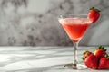 A glass of strawberry daiquiri cocktail and fresh strawberries on the table Royalty Free Stock Photo