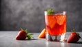 A glass of strawberry juice with a slice of orange and strawberries on the table Royalty Free Stock Photo