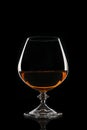 Glass of strong alcoholic drink cognac