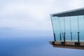 A glass structure with a view of the ocean. Royalty Free Stock Photo