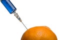 Glass syringe and orange