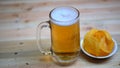 Glass tankard with lager beer