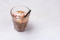 Glass of Tasty Chocolate Milk with Colorfull Marshmallow and Straw Light Gray Background Copy Space Horizontal