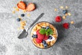 Glass of tasty homemade granola dessert on table, flat lay. Healthy breakfast Royalty Free Stock Photo