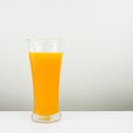 The glass of tasty pure orange juice Royalty Free Stock Photo