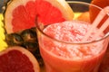 Glass of tasty red smoothie, closeup