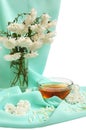 Glass tea cup and flowers Royalty Free Stock Photo