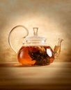 Glass tea pot on the table indoors Royalty Free Stock Photo