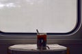 A glass of tea in the train car. Royalty Free Stock Photo