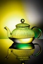 Glass teapot with boiling water and drops of condensation Royalty Free Stock Photo