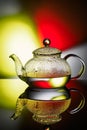 Glass teapot with boiling water and drops of condensation Royalty Free Stock Photo