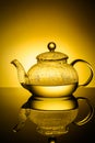 Glass teapot with boiling water and drops of condensation Royalty Free Stock Photo