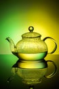 Glass teapot with boiling water and drops of condensation Royalty Free Stock Photo