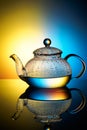 Glass teapot with boiling water and drops of condensation Royalty Free Stock Photo