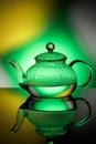 Glass teapot with boiling water and drops of condensation Royalty Free Stock Photo